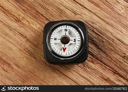 compass on old wooden background