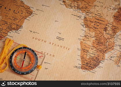 compass on old world map