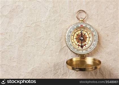 compass on the background of old paper