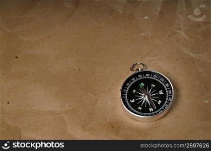 Compass over old grunge paper
