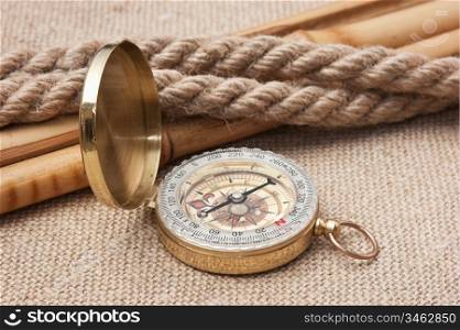 Compass with ropes and bamboo on a canvas