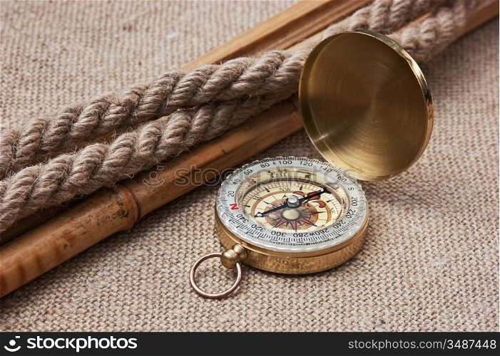 Compass with ropes and bamboo on a canvas