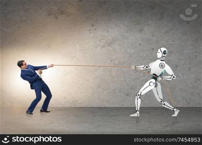 Competition between humans and robots in tug of war concept