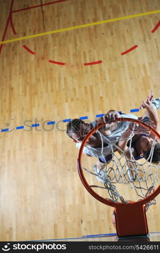 competition cencept with people who playing basketball in school gym