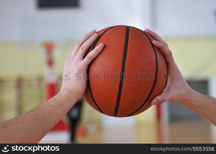 competition cencept with people who playing basketball in school gym