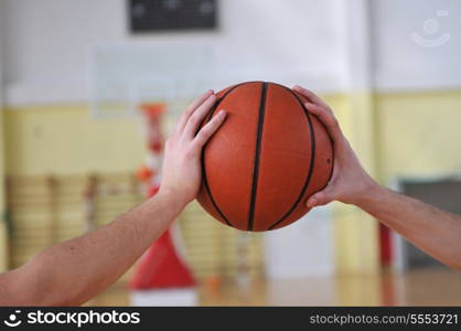 competition cencept with people who playing basketball in school gym