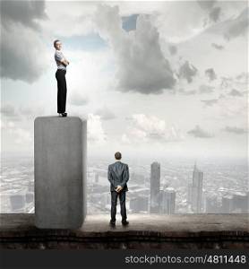 Competitive business. Conceptual image of businessman and businesswoman standing on top of bar
