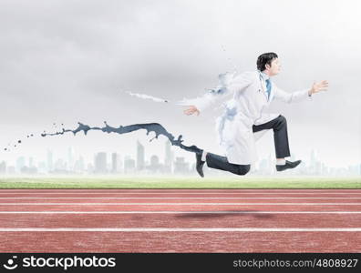 Competitive business. Funny image of doctor running at stadium