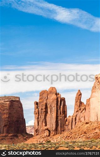 Complementary colours blue and orange in this iconic view of Monument Valley, USA