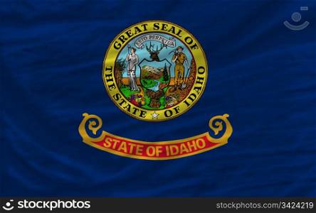 complete flag of us state of idaho covers whole frame, waved, crunched and very natural looking. It is perfect for background