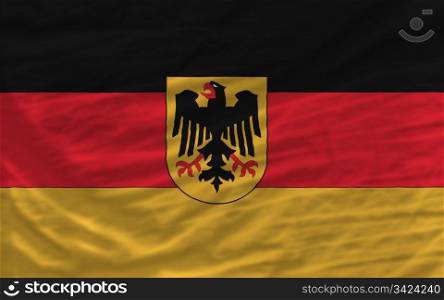complete national flag of germany covers whole frame, waved, crunched and very natural looking. It is perfect for background