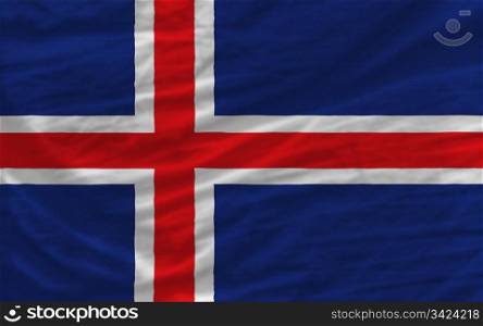 complete national flag of iceland covers whole frame, waved, crunched and very natural looking. It is perfect for background