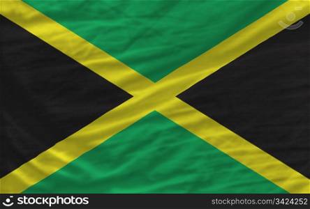 complete national flag of jamaica covers whole frame, waved, crunched and very natural looking. It is perfect for background