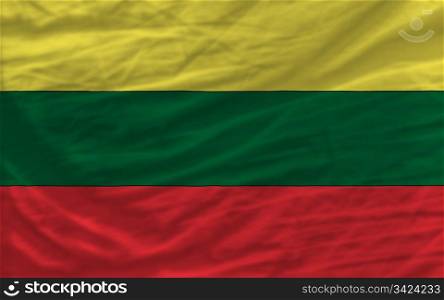 complete national flag of lithuania covers whole frame, waved, crunched and very natural looking. It is perfect for background