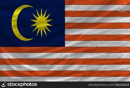complete national flag of malaysia covers whole frame, waved, crunched and very natural looking. It is perfect for background