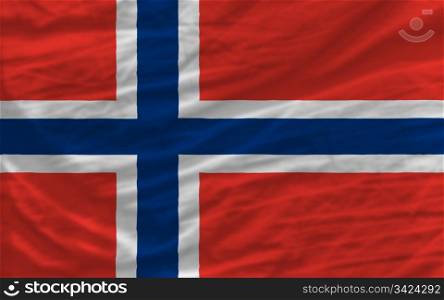 complete national flag of norway covers whole frame, waved, crunched and very natural looking. It is perfect for background