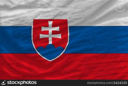 complete national flag of slovakia covers whole frame, waved, crunched and very natural looking. It is perfect for background