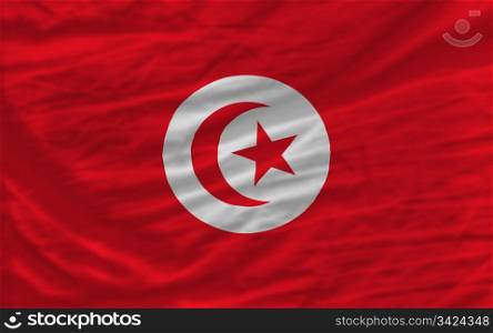complete national flag of tunisia covers whole frame, waved, crunched and very natural looking. It is perfect for background