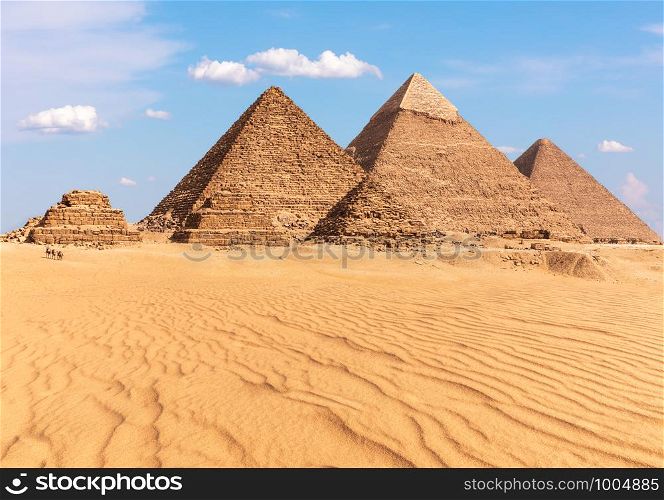 Complex of Giza Pyramids in Egypt, sunny day view.. Complex of Giza Pyramids in Egypt, sunny day view