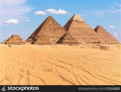 Complex of Giza Pyramids in Egypt, sunny day view.. Complex of Giza Pyramids in Egypt, sunny day view