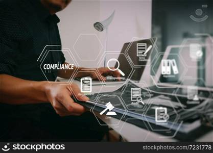 Compliance Virtual Diagram for regulations, law, standards, requirements and audit.businessman working with smart phone and digital tablet and laptop computer and document in modern office