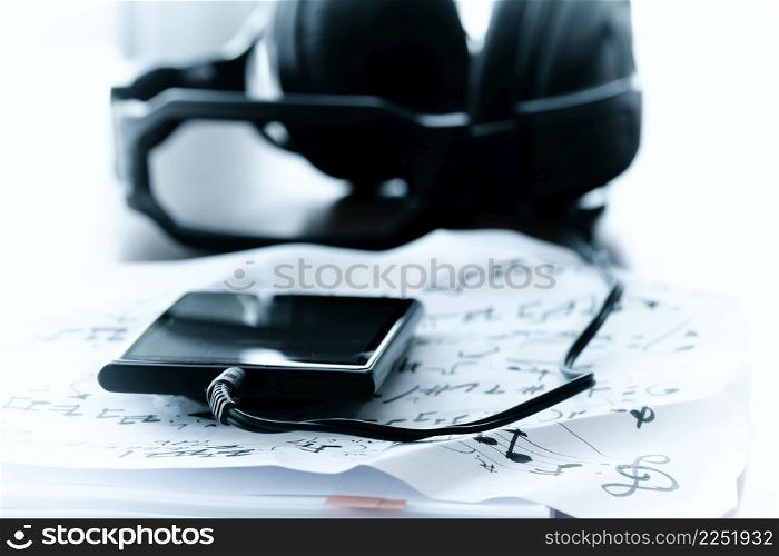 composing music concept with shallow DOF evenly matched jack of headphone and copy space