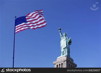 Composite image of the Statue of Liberty and the US Flag
