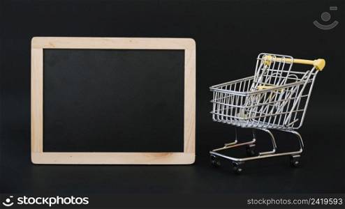 composition black friday with slate cart