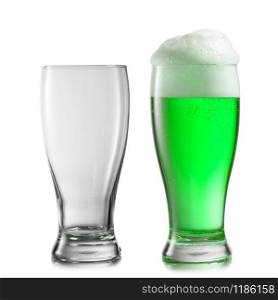 Composition from two glasses empty and filled fresh natural green beer drink with thick foam on a white background, copy space. Happy St.Patrick &rsquo;s Day concept.. Empty and full glasses of green beer on a white background.