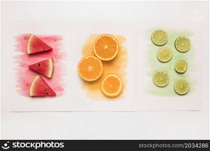 composition juicy cut fruits colored watercolor splash