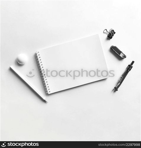 composition notebook paper pencil compass clip magnet