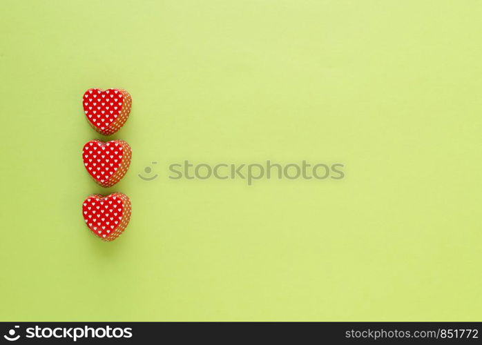 Composition of heart shape valentine cupcake metallic container