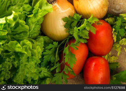 composition of vegetables, tomato, onions, lettuce and basil