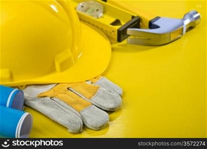 composition of working tools on yellow table