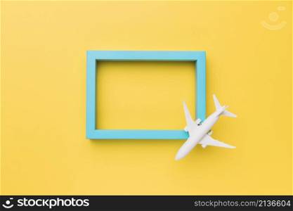 composition small airplane blue frame