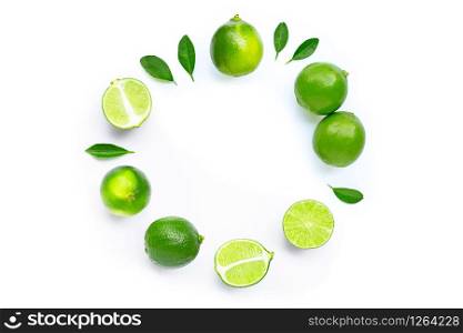 Composition with fresh ripe limes on white background. Copy space