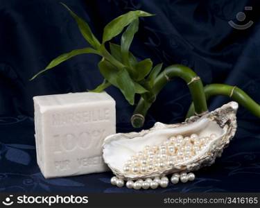 Composition with natural soap on a blue background