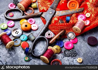 Composition with threads and sewing accessories.Sewing kit. Sewing threads and accessories