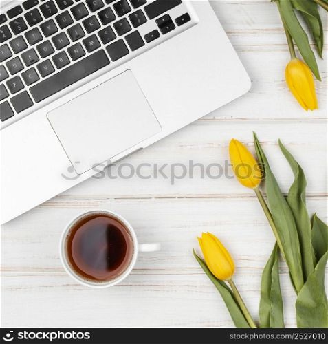 composition yellow tulips work desk