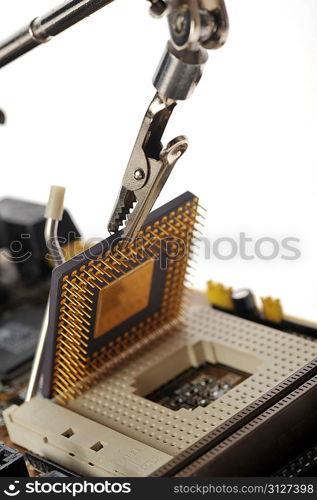 computer Central processor being installed by robot arm