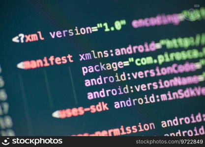 Computer code on the screen. XML code lines on a display