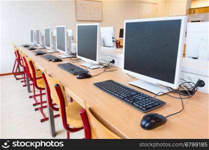 Computer education in classroom on high school