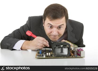Computer Engineer working in a motherboard, isolated