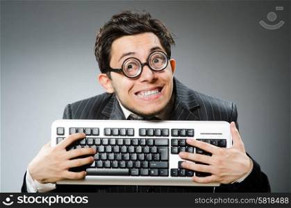 Computer geek with computer keyboard