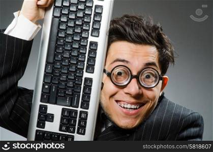 Computer geek with computer keyboard