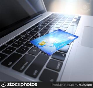 Computer generated image credit card on laptop&rsquo;s keyboard. Electronic commerce concept.