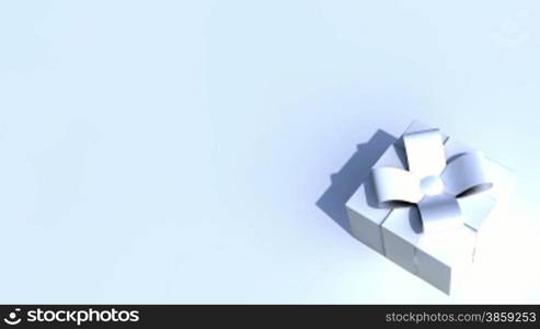 Computer generated looping animation of a gift box rotating.