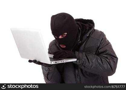 Computer hacker with white laptop