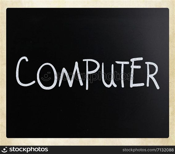 ""Computer" handwritten with white chalk on a blackboard"