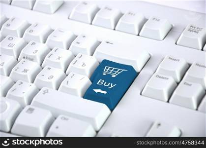 Computer keyboard with on-line shopping symbol on it